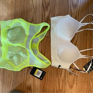 2 Nike sports bras. Both brand new with the tags. Size small